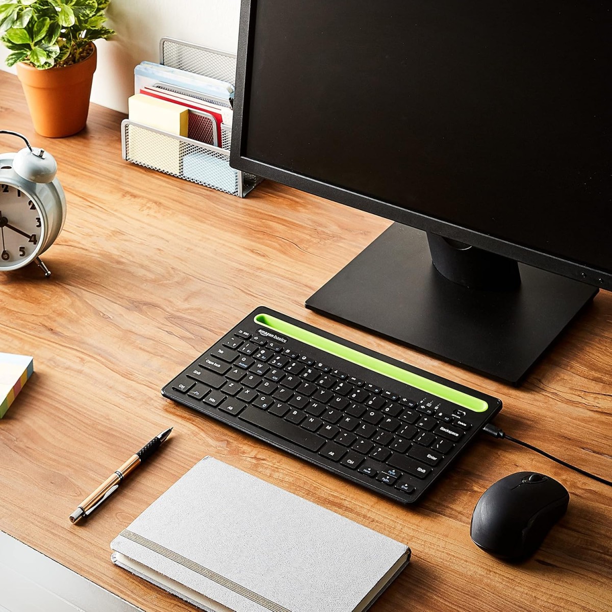 amazon basics Wireless Bluetooth Multi-Device Keyboard for Windows, Apple iOS Android or Chrome, Compact Space-Saving Design (Black)