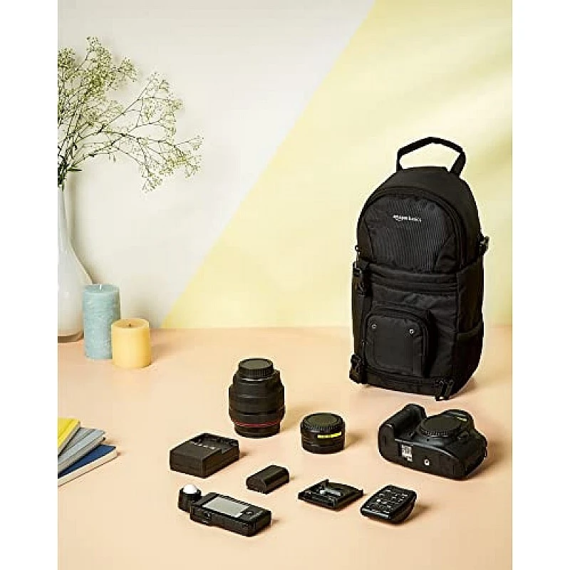 Amazon Basics Camera Sling Bag, for DSLR Camera with Lens, Accessories, Adjustable Padded Strap, Black Amazon Basics Camera Sling Bag, for DSLR Camera with Lens, Accessories, Adjustable Padded Strap, Black